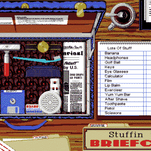Gameplay screenshot from Stuffin the Briefcase, a hidden-object puzzle game from Epyx’s Getaway Laptop Entertainment 6-Pack. The screen shows a cluttered briefcase filled with everyday objects, alongside a checklist of items to find.